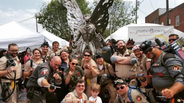 Cosplayer with Mothman statue